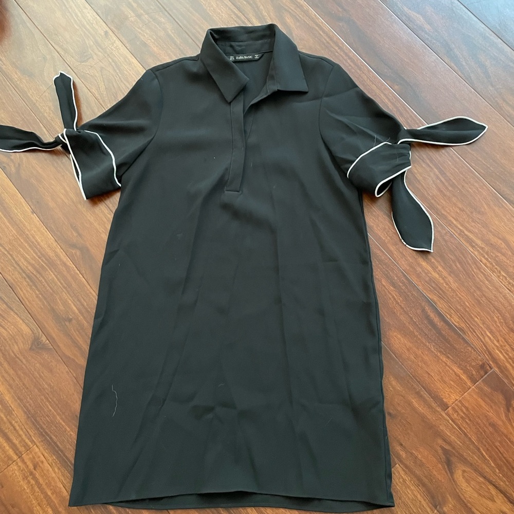 Black w/ white detail on sleeve ties size small from Zara